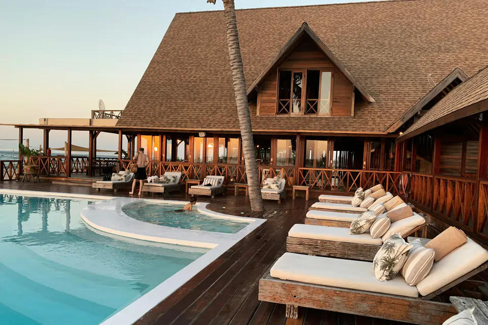 A pool-side hospitality setting under soft light